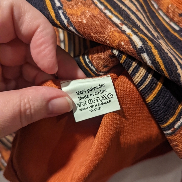 Zanzia orange and multi striped button down tunic in a ribbed polyester. - Picture 6 of 7